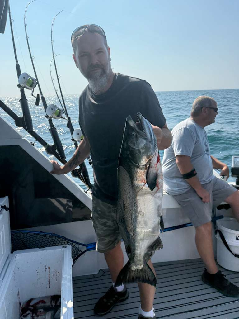 Angler holding trophy salmon